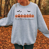 Cute Halloween Sweatshirt for women featuring the words Tis The Season. allSKUs
