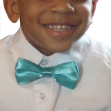 toddler wearing turquoise blue bowtie
