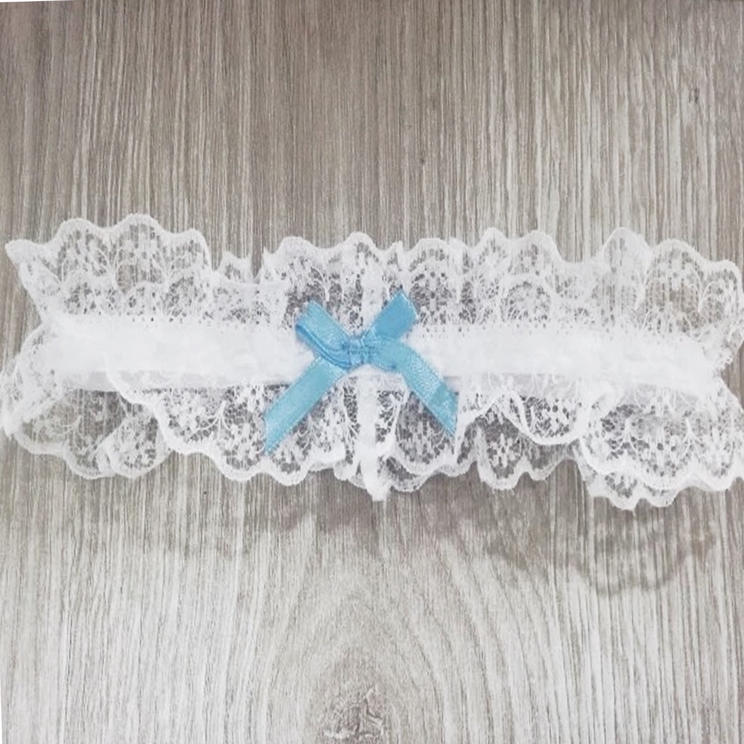 White Elegant Floral Lace with Blue Ribbon Garter Flat
