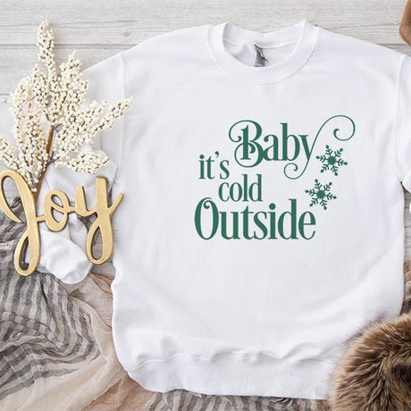 Flat Lay Picture of White Sweatshirt - Gildan 18000 - Baby It's Cold Outside design in Green print - all SKUs