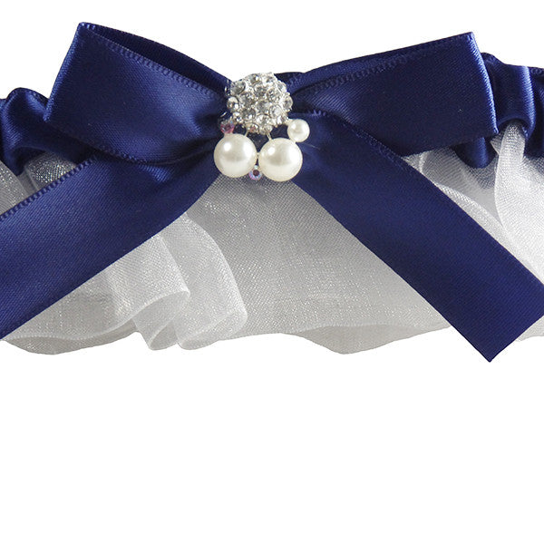 white tulle skirt garter with pearls and blue closeup