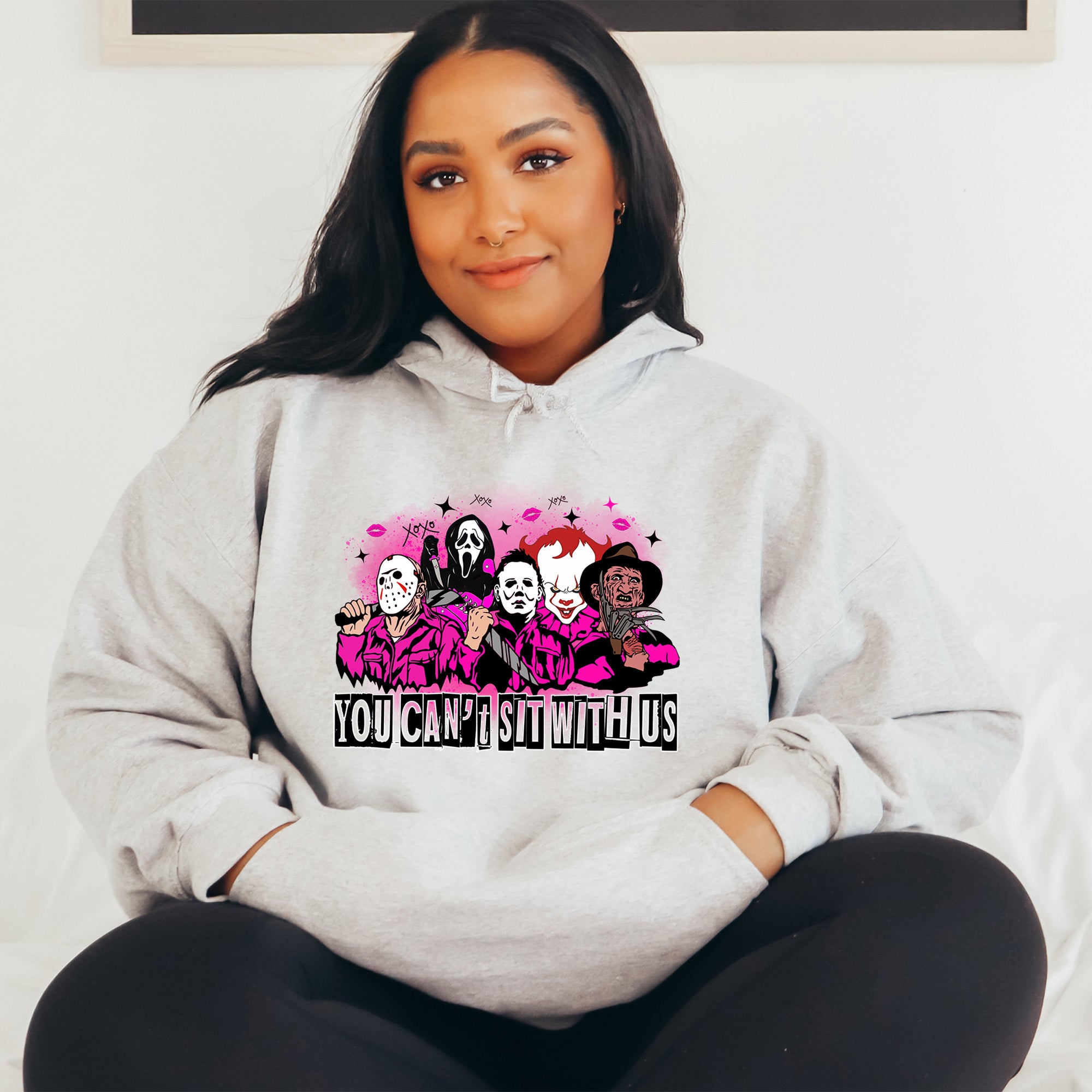 Great Halloween Graphic Sweatshirt featuring all the top Halloween crazies and the text You Can't Sit With Us. allSKUs